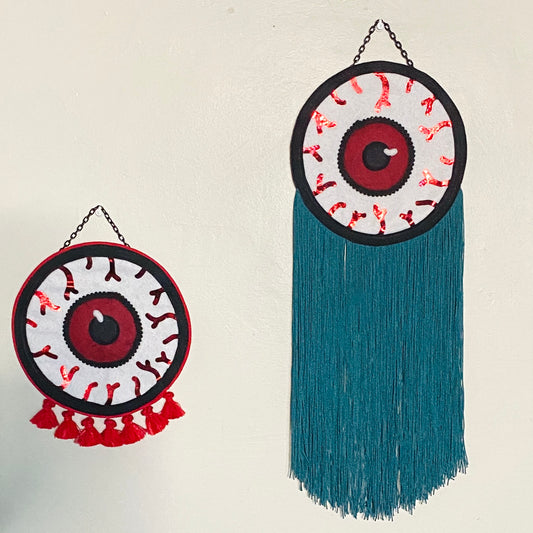 Red Eye long teal fringe banner
